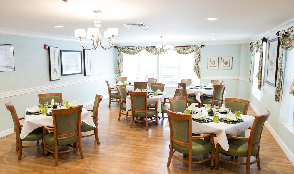 a room with tables and chairs