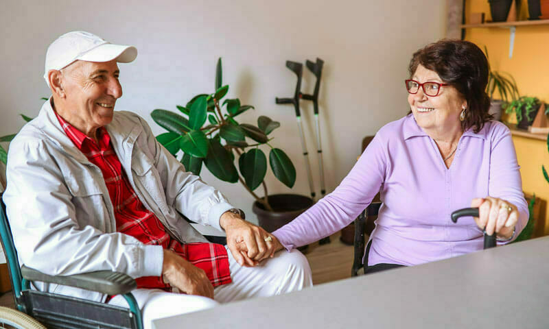 Resident couple relaxes in their room.