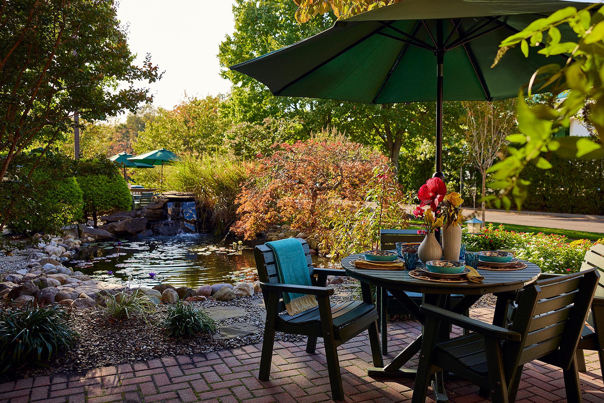 Al fresco dining alongside the pond