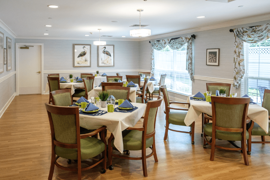 a room with tables and chairs